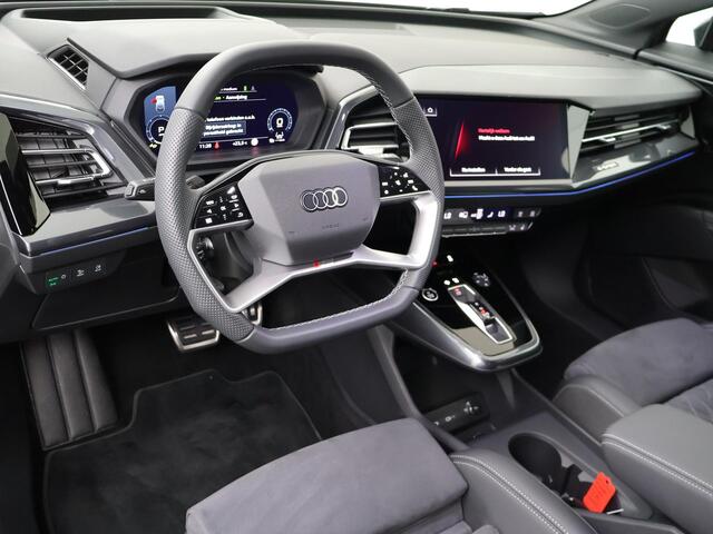 Audi Q4 e-tron 45 quattro S Edition 82 kWh | 286 PK | SoH 100% | Trekhaak | Matrix LED koplampen | Warmtepomp | 21" LM velgen | S line |