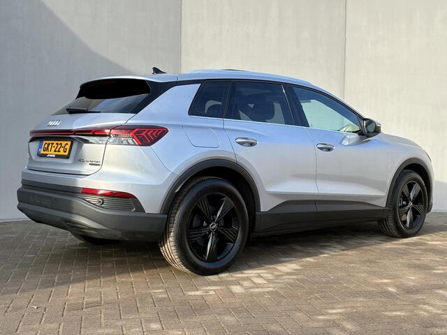 Audi Q4 e-tron 45 quattro Edition 82 kWh / Fabrieksgarantie t/m 09-2028/100.000km / SOH 100% / Navigatie / Schuif-/Kantel dak / Apple Carplay/Android Auto / Stoelverwarming / Elektrische Achterklep / SONOS Audio / Adaptieve Cruise Control /
