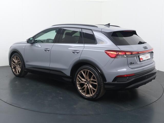 Audi Q4 e-tron 45 S Edition 82 kWh | 286 PK | SoH 100% | Adaptive cruise control | 21"LM velgen | Keyless | S line | Stoelverwarming |