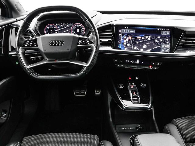 Audi Q4 e-tron 40 S edition 204pk / 77 kWh · SOH 97,4% · Panoramadak · Camera · Head-Up Display · Stoelverwarming · Apple/Android Car Play · Adaptive Cruise Control · 20"Velgen ·