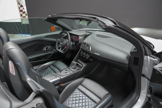 Audi R8 Spyder 5.2 V10 620pk performance quattro |Suzuka Grau|dealer onderhouden|Carbon exterieur|Carbon interieur|Audi Exclusive|digital cockpit|Bang & Olufsen|keramisch|Apple Carplay|DAB|stoelverwarming|