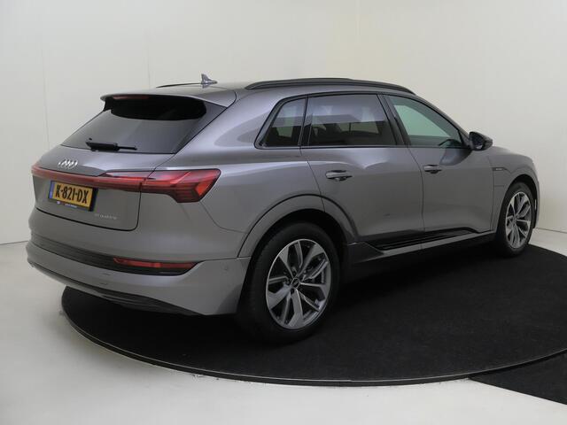Audi e-tron 50 quattro Business edition Plus 71 kWh | Panoramadak | Luchtvering | Parkeerasisstent | Lederen bekleding | Stoelverwarming | Navigatie Plus | Adaptieve cruise control |