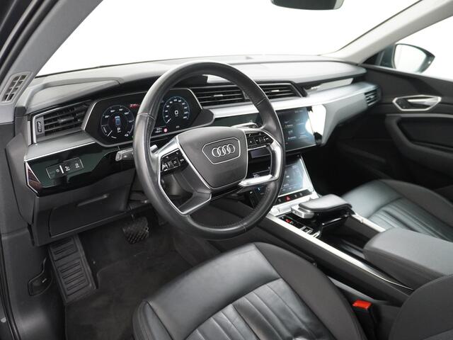 Audi e-tron 50 Quattro Launch Edition Plus 71kWh Leder+Verwarmd+Geheugen Apple Carplay Navi Panoramadak Luchtvering Adap.Cruise PDC Camera Stoelverwarming Pdc Led Lmv 20" Keyless-go Lichtpakket Dodehoekdetectie Regensensor Rijstrooksensor Lichtpakket Dealeronderhoude