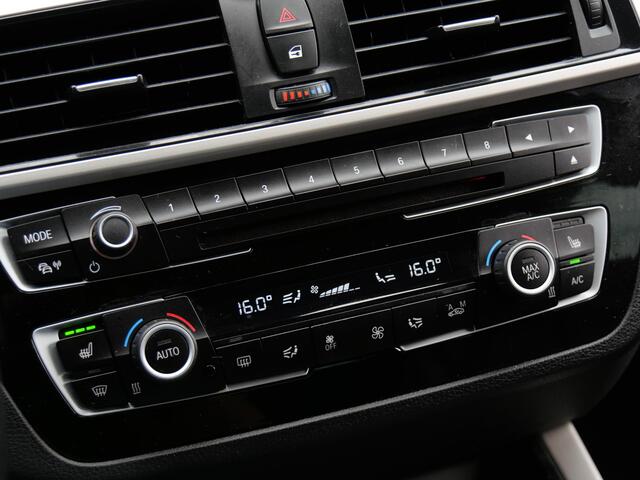 BMW 1-SERIE 5D 118i HIGH EXECUTIVE/ LEER/ NAVI/ PDC V+A