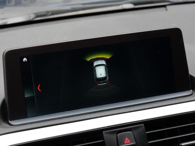 BMW 1-SERIE 5D 118i HIGH EXECUTIVE/ LEER/ NAVI/ PDC V+A