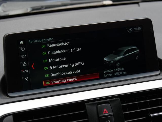 BMW 1-SERIE 5D 118i HIGH EXECUTIVE/ LEER/ NAVI/ PDC V+A