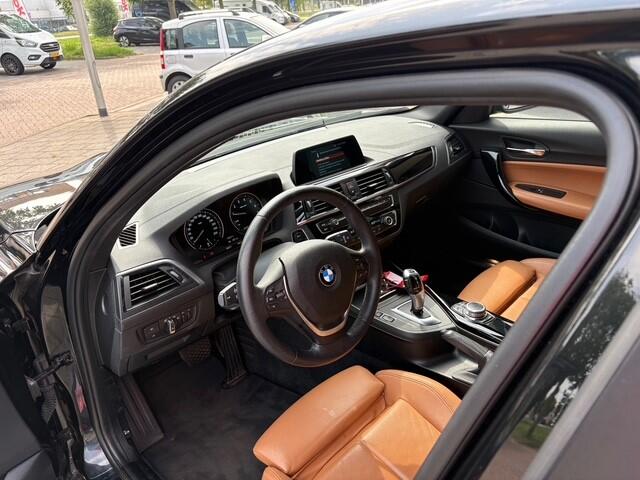 BMW 1-SERIE 118i Executive | Navi | Cruise | Leer | 89671 km Dealeronderhouden