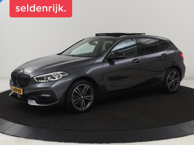 BMW 1-SERIE 118i Sport Line | Panoramadak | Stoelverwarming | Carplay | Sportstoelen | Camera | Park Assist | Sfeerverlichting | Climate control | Live Cockpit