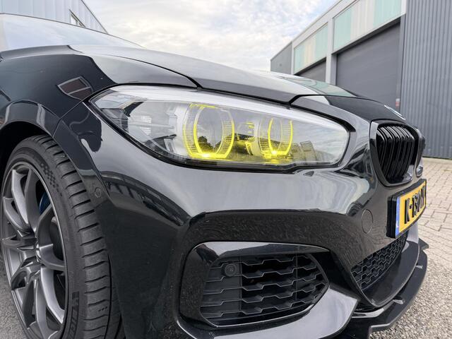 BMW 1-SERIE M140i xDrive Edition Shadow High Executive OPEN DAK | ACHTERUIT RIJ CAMERA | NAVIGATIE | SFEERVERLICHTING | HARMANKARDON | F1 STUUR | LEDER | ELEKTRISCHE STOELEN MEMORY |