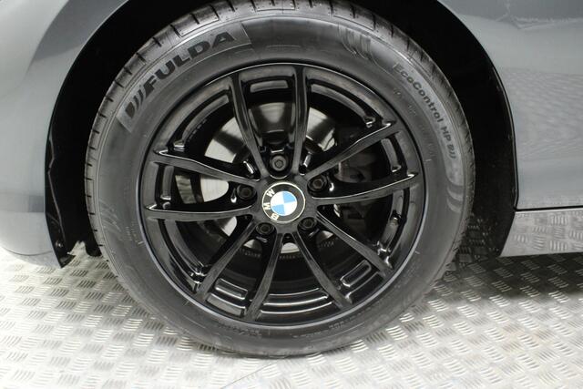 BMW 1-SERIE 118i Corporate Lease Executive | automaat | climate control | navi fullmap | afn. trekhaak | pdc achter | keyless | bluetooth | cruise