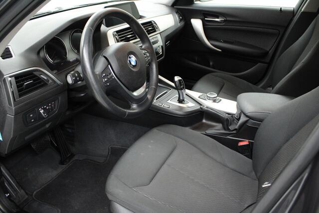 BMW 1-SERIE 118i Corporate Lease Executive | automaat | climate control | navi fullmap | afn. trekhaak | pdc achter | keyless | bluetooth | cruise