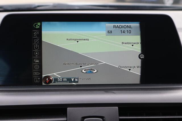 BMW 1-SERIE 118i Centennial Executive Navigatie, Stoelverwarming, Cruise control, Lichtmetalen wielen, Elektrische ramen