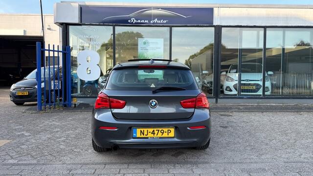 BMW 1-SERIE 118i Centennial High Executive | AUTOMAAT | PANODAK | LEER