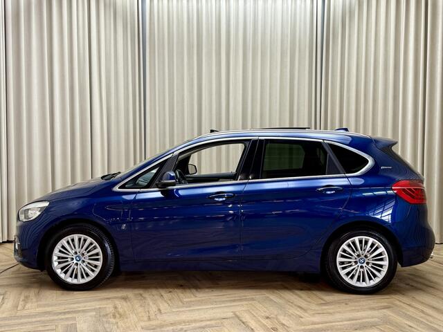 BMW 2-SERIE Active Tourer 225xe iPerformance High Executive *Panoramadak* Adapt. Cruise / Keyless / Leder / Camera / Navigatie / Stoelverwarming / 17'' LMV