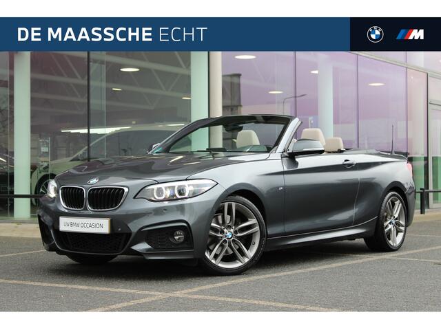 BMW 2-SERIE Cabrio 220i High Executive M Sport Automaat / Achteruitrijcamera / Sportstoelen / M Sportonderstel / Navigatie Professional / Stoelverwarming