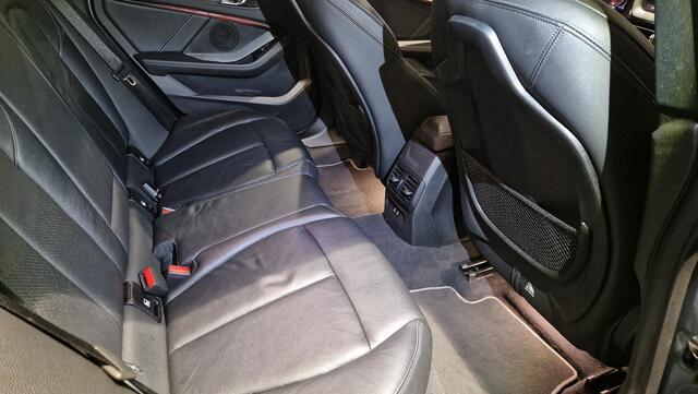 BMW 2-SERIE Gran Coupé 220i High Executive Edition | Panoramadak | Leder | Adaptieve cruise control | Head-Up | Trekhaak |