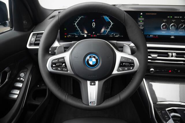BMW 3-SERIE Sedan 320e | M Sportpakket | Travel Pack | Entertainment Pack