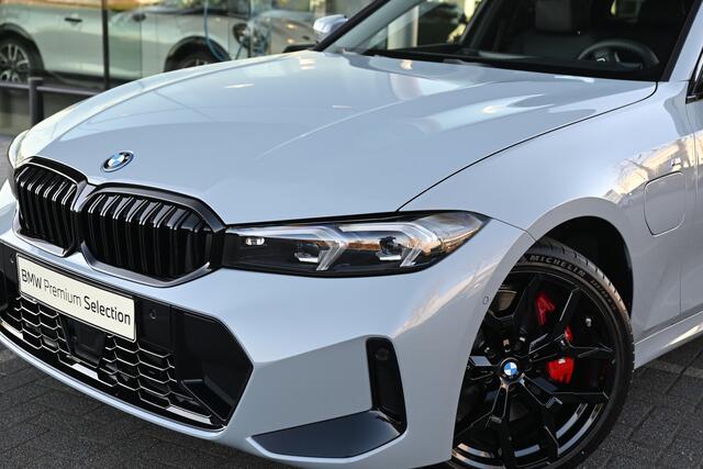 BMW 3-SERIE Touring 330e M Sport Automaat / Trekhaak / Panoramadak / Harman Kardon / Adaptive Cruise / Comfort Access / 19" LM-velgen