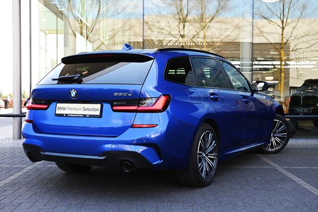 BMW 3-SERIE Touring 330e High Executive M Sport Automaat / Panoramadak / Trekhaak / Sportstoelen / LED / Parking Assistant / Live Cockpit Professional / Stoelverwarming