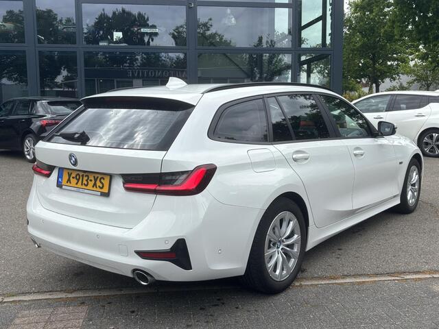 BMW 3-SERIE Touring 330e High Executive TREKHAAK AFNEEMBAAR | LASERLIGHT | HEAD UP
