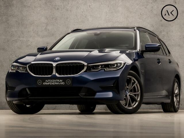 BMW 3-SERIE Touring 320e Sportline 204Pk Automaat (PANORAMADAK, APPLE CARPLAY, GROOT NAVI, MEMORY SEATS, CAMERA, LEDEREN SPORTSTOELEN, SFEERVERLICHTING, GETINT GLAS, ELEK ACHTERKLEP, NIEUWSTAAT)