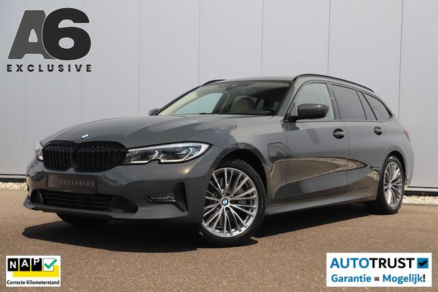 BMW 3-SERIE Touring 330e Business Edition Plus 292PK Black Pack Individual Automaat Trekhaak Sportstoelen Leder 18 inch Laser LED Navigatie Carplay Clima Cruise Stoelverwarming SOH 92%