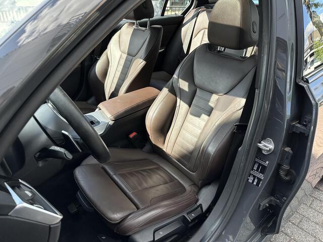 BMW 3-SERIE 320i High Executive Edition Schuifdak HeadUp Leer Cruise Harman/Kardon 18''LM