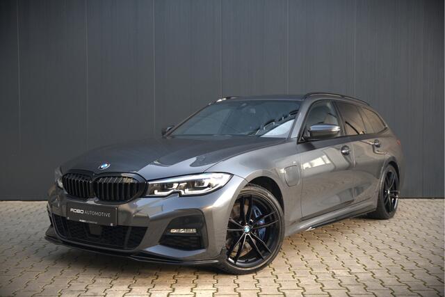 BMW 3-SERIE Touring 330e High Executive M Sport | M Performance | PDC | Leer | Hifi | Ambiance Verlichting | Stoelverwarming | Adaptive Cruise Control | BTW | LED | Shadow Line | Keyless | Navigatie Prof. | DAB | Elek. Trekhaak