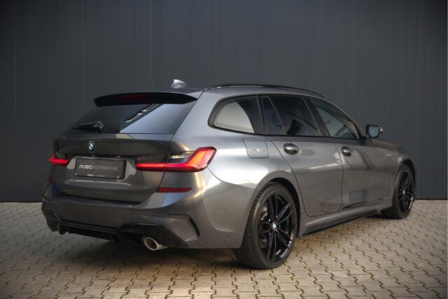 BMW 3-SERIE Touring 330e High Executive M Sport | M Performance | PDC | Leer | Hifi | Ambiance Verlichting | Stoelverwarming | Adaptive Cruise Control | BTW | LED | Shadow Line | Keyless | Navigatie Prof. | DAB | Elek. Trekhaak