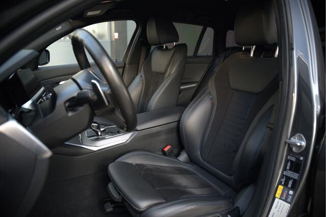 BMW 3-SERIE Touring 330e High Executive M Sport | M Performance | PDC | Leer | Hifi | Ambiance Verlichting | Stoelverwarming | Adaptive Cruise Control | BTW | LED | Shadow Line | Keyless | Navigatie Prof. | DAB | Elek. Trekhaak