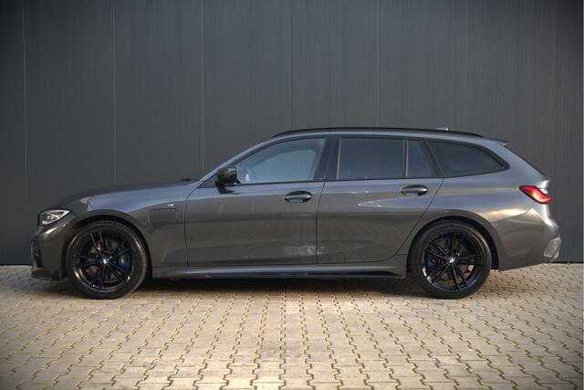 BMW 3-SERIE Touring 330e High Executive M Sport | M Performance | PDC | Leer | Hifi | Ambiance Verlichting | Stoelverwarming | Adaptive Cruise Control | BTW | LED | Shadow Line | Keyless | Navigatie Prof. | DAB | Elek. Trekhaak