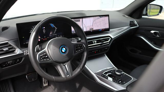 BMW 3-SERIE Touring 330e M-Sport | Adaptieve Cruise Control | HiFi | Achteruitrijcamera | Shadow Line