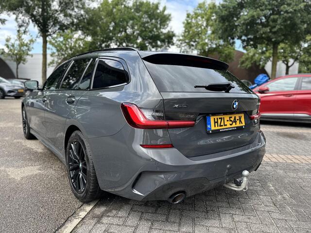 BMW 3-SERIE Touring 330e xDrive PANO | ADD. CRUISE | CAMERA | ELEKTRISCHE TREKHAAK | RIJKLAAR GELEVERD MET 12 MND BOVAG GARANTIE