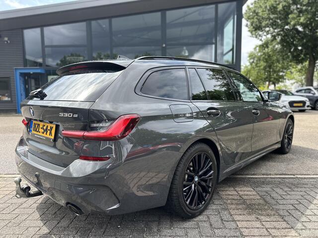 BMW 3-SERIE Touring 330e xDrive PANO | ADD. CRUISE | CAMERA | ELEKTRISCHE TREKHAAK | RIJKLAAR GELEVERD MET 12 MND BOVAG GARANTIE