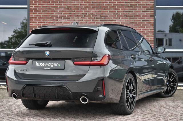 BMW 3-SERIE Touring 330e xDrive M-Sport Pro LCI Dravitgrau Pano HUD el-zetels 19inch