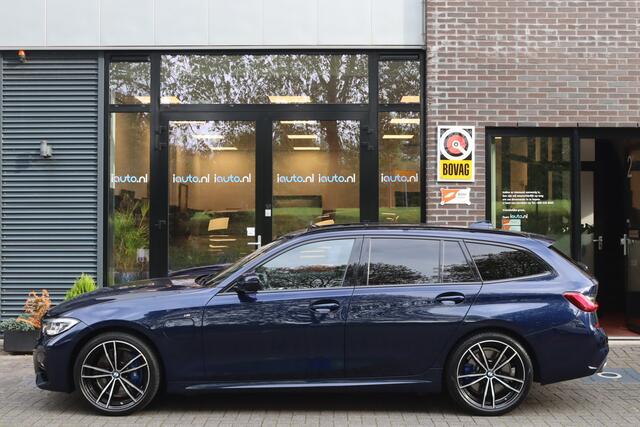 BMW 3-SERIE Touring 330e M-Sport Shadow Line Pano/Laser LED/Keyless/Head-up/DCC/Elek. stoel+mem/Dodehoek/19"/Trekhaak wegkl.