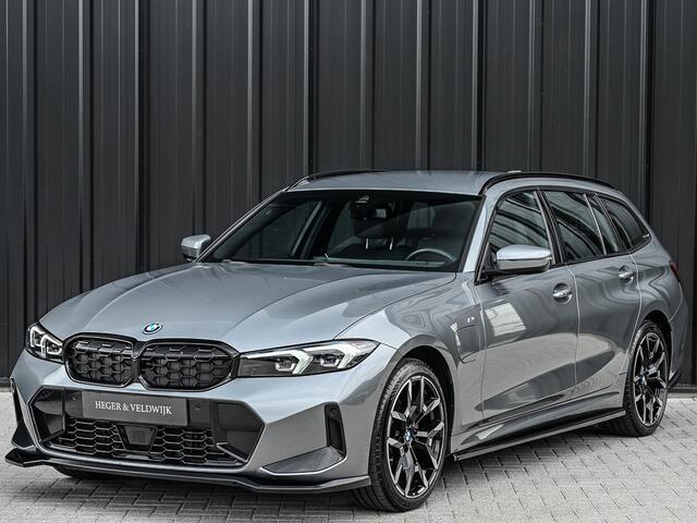 BMW 3-SERIE Touring 330e xDrive M-SPORT | FACELIFT | ACCU 19,5 kWh | ACTIVE CRUISE | ELEKTR. TREKHAAK | HIFI AUDIO | SHADOW LINE | CAMERA | FULL-LED | STUUR- EN STOELVERWARMING