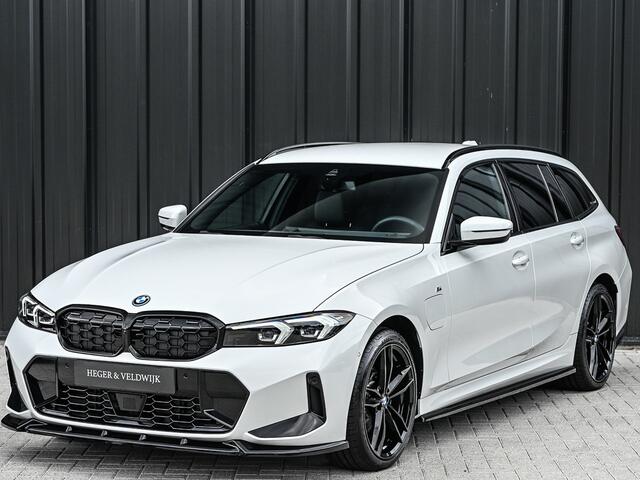 BMW 3-SERIE Touring 330e xDrive M-SPORT | FACELIFT | ACCU 19,5 kWh | ACTIVE CRUISE | HIFI AUDIO | CAMERA | FULL-LED | STUUR- EN STOELVERWARMING | EL. TREKHAAK