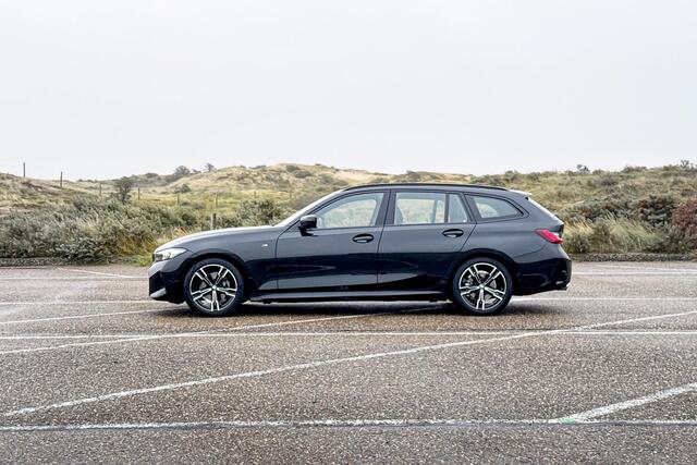 BMW 3-SERIE Touring 318i | M Sport | Stoelverwarming | Trekhaak |