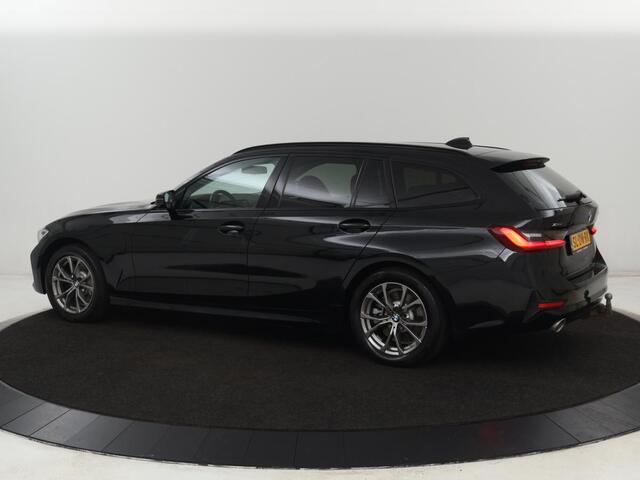 BMW 3-SERIE Touring 330e | Trekhaak | Half Leder | Stoel & Stuurverwarming | Sfeerverlichting | Carplay | Cruise Control | PDC