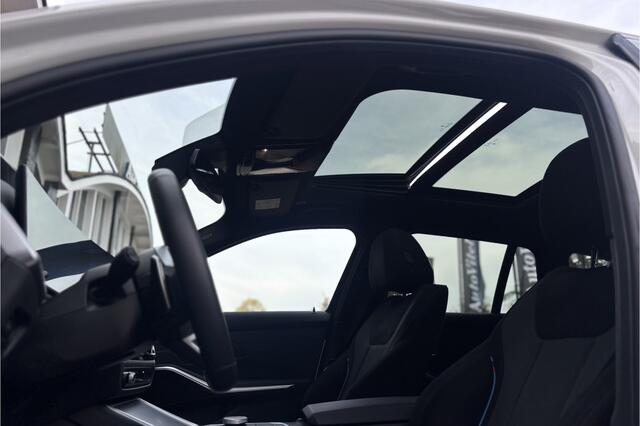 BMW 3-SERIE Touring 330e M-Sport | 19,5 kWh Accu | Panodak | Head-Up | Memory | Trekhaak | 360° Camera | Fabrieksgarantie