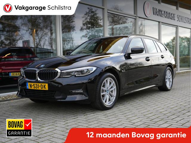 BMW 3-SERIE Touring 320e Business Edition Plus | Navigatie | SOH 91% | Laserlicht | Keyless