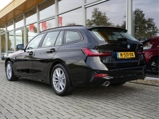 BMW 3-SERIE Touring 320e Business Edition Plus | Navigatie | SOH 91% | Laserlicht | Keyless