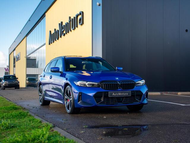 BMW 3-SERIE Touring 330e l Long Range l Trekhaak l M-sport l Schuif-/kantel dak l Adaptive LED l Verwarmd Stuurwiel l Head-Up l