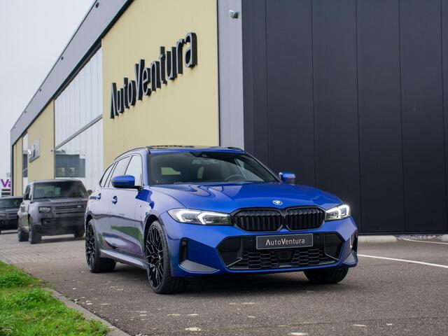 BMW 3-SERIE Touring 330e l Long Range l Trekhaak l M-sport l Schuif-/kantel dak l Adaptive LED l Verwarmd Stuurwiel l Head-Up l