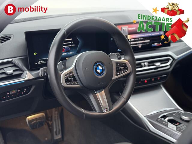 BMW 3-SERIE Touring 320e High Executive M-Sport LCI Wide Screen Apple CarPlay | DAB | Leer | Stoelverwarming