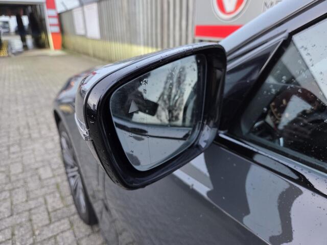 BMW 3-SERIE 320e High Executive 18"/Leder/Laser LED/Stuur + stoelverwarming/Dodehoek/Elektrische klep/Trekhaak/Hed-up/Keyless