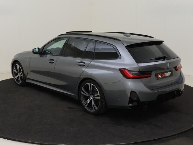 BMW 3-SERIE Touring 318i M Sport / Pano / 19 inch / Adap. Cruise / Géén Afleverkost