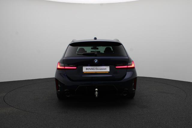 BMW 3-SERIE Touring 320e M Sportpakket Pro | Travel Pack | Innovation Pack | Comfort Pack | Trekhaak | Panoramadak | 19"