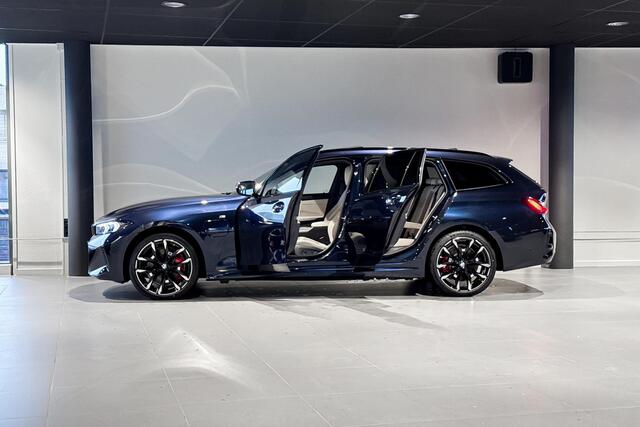 BMW 3-SERIE Touring 330e | M Sport Pro | Glazen Panoramadak | Harman Kardon | Trekhaak |